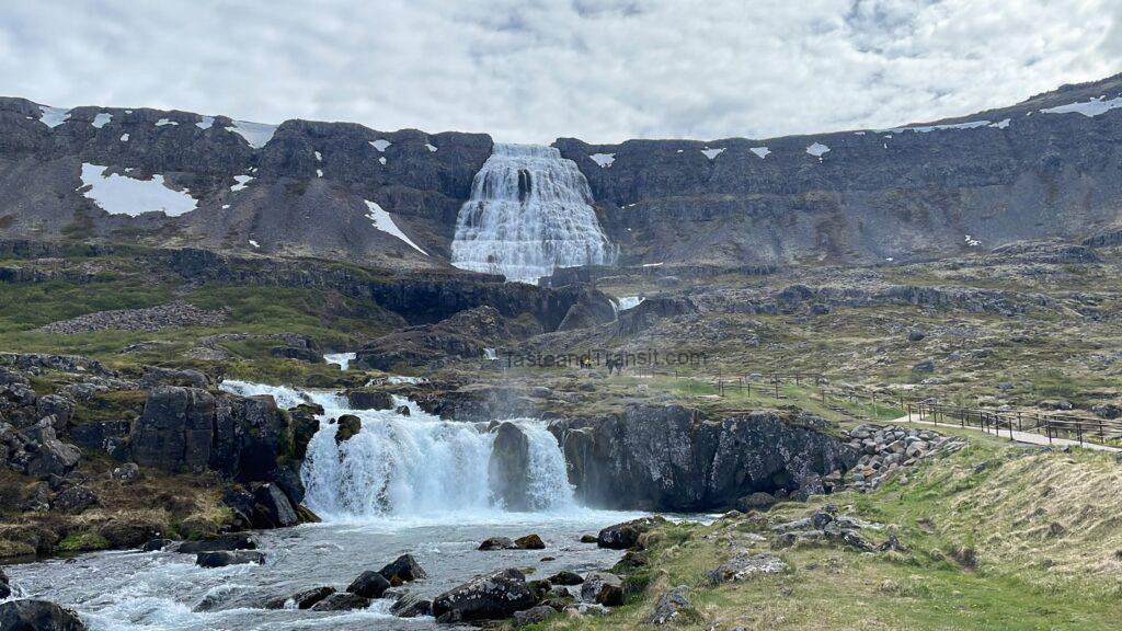 Dynjandi waterfall cascading over rocky cliff ledges in Iceland